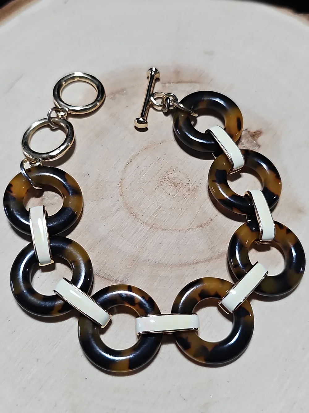 Tortoiseshell Link Bracelet with Gold Accents one side the other white